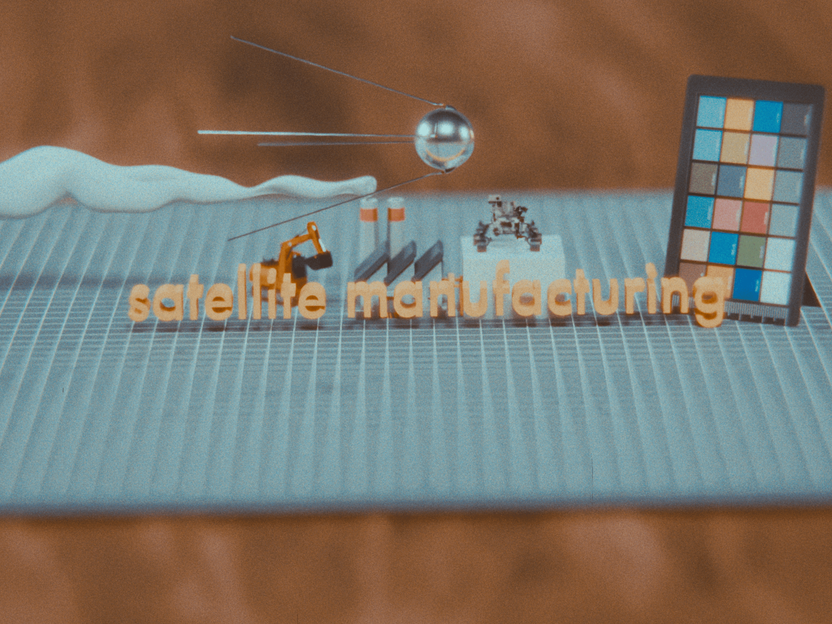 The title card for the 'Satellite Manufacturing' section. Featuring a factory, excavator, curiosity rover, and more in miniature on a cutting mat.