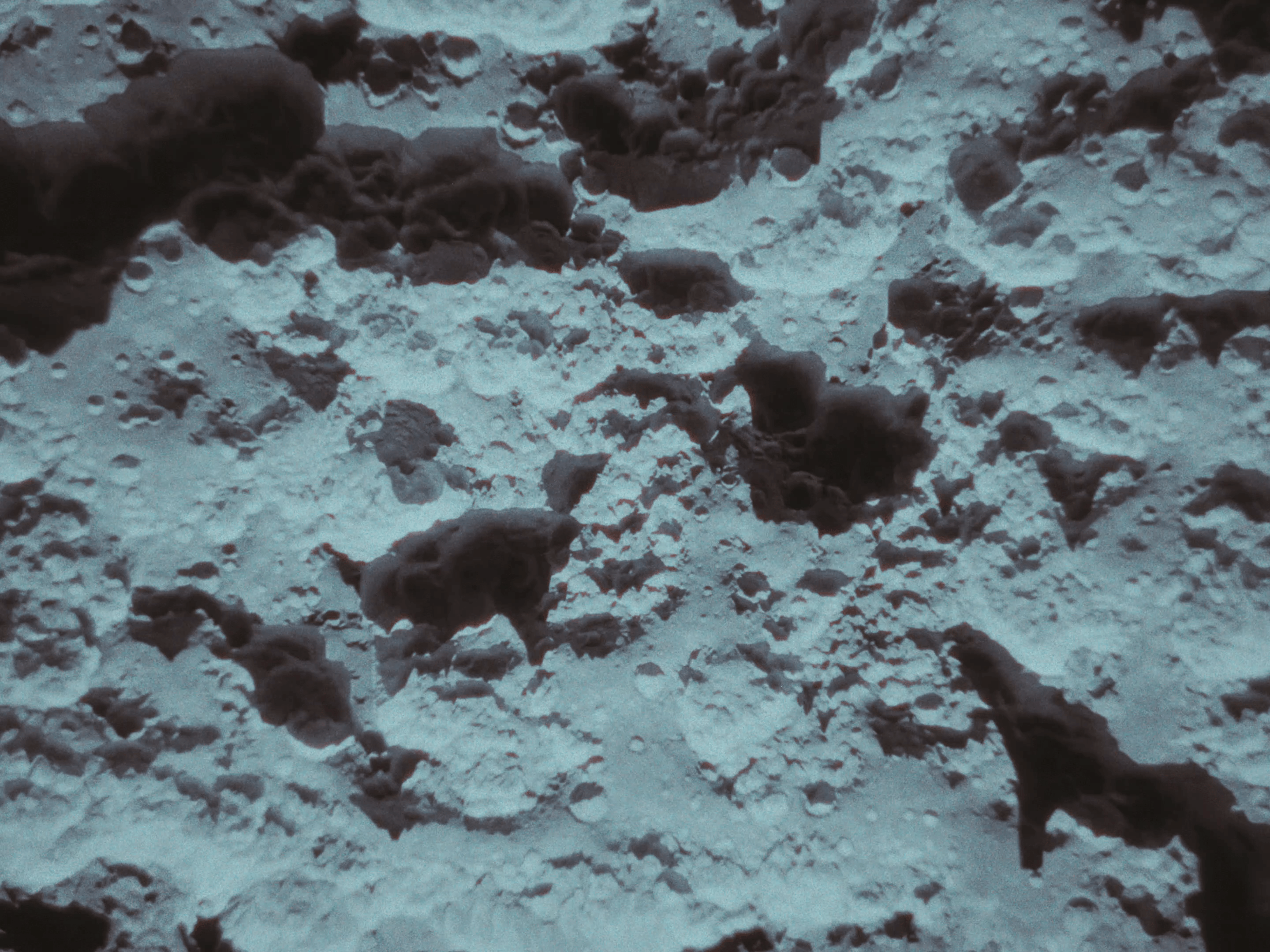 A top-down shot of the lunar surface.