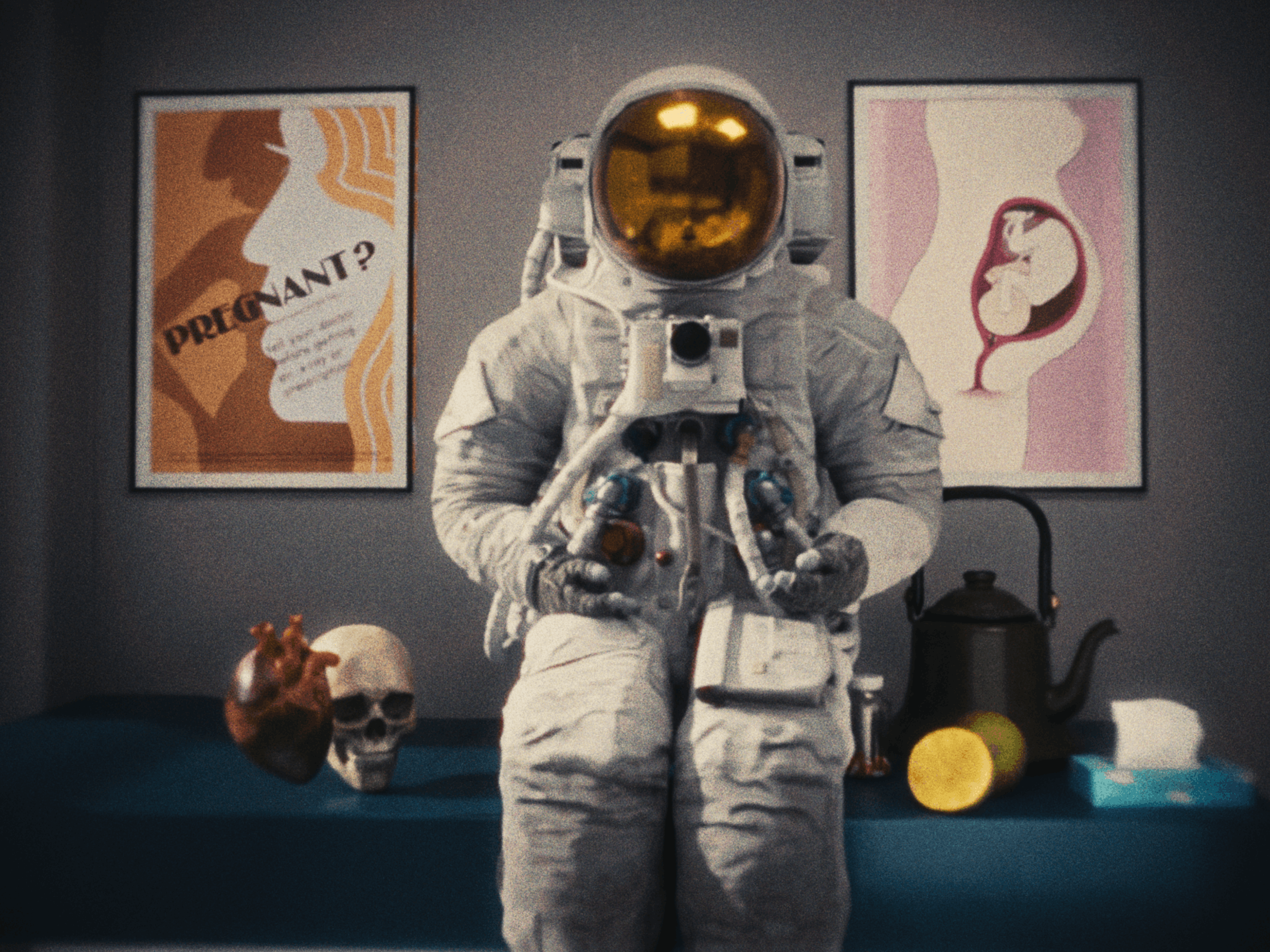 Miss A7L in a doctors office with an assortment of pregnancy related items.